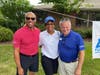 Samaritan’s Chief Development Officer Chris Rollins (right) with Samaritan Board Chair Phillip Heath (left) and his wife Marché Heath (center) at the organization’s 2022 Drive FORE! A Good Cause golf tournament.