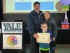 Sebastian Barrila, a first grade student at Y.A.L.E. School NJ, stood proudly with his parents Sebastian and Danielle, after receiving “The Red Resist Award” at the Tri-State DisAbility Art Show.