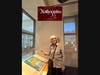 Judy Detrick , the author’s teacher posed with Our Lady of Calligraphy last June 2025; she also designed the Kalligraphia logo.