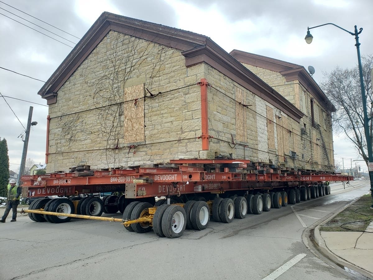 Joliet's historic Casseday House makes its way on its four-block journey on Monday.