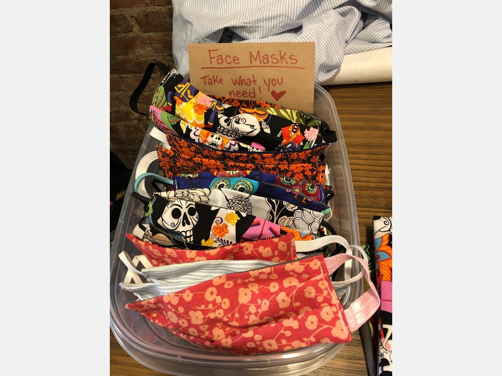 A basket of homemade masks is left on Rebecca Beeman's stoop.