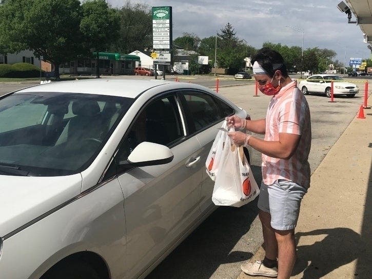 Michael Polimenakos (above) says an innovative new drive-thru system is working better than the owners of Louis' Family Restaurant could have imagined.