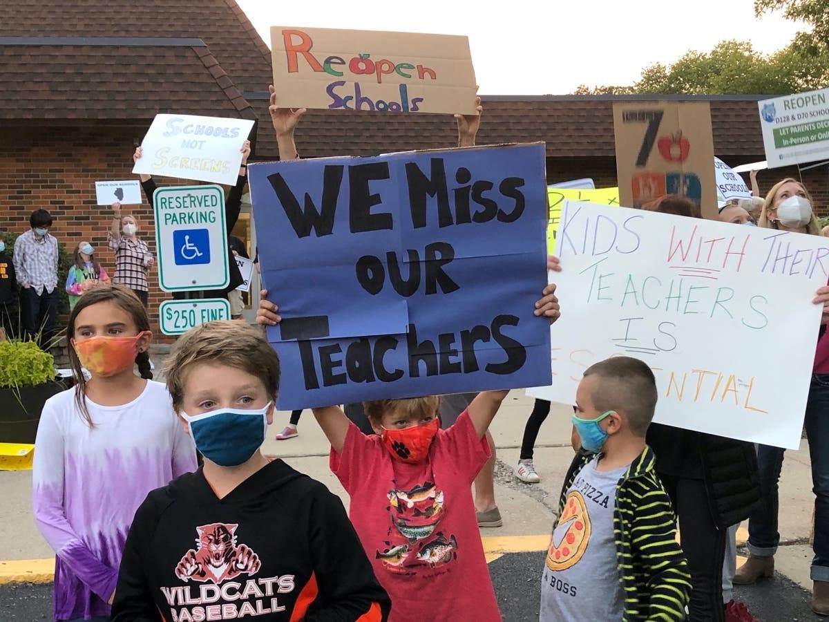 Hundreds of District 70 parents and students rallied on Monday night to push for in-person learning