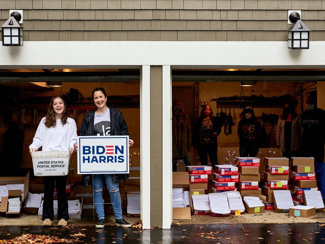 Tracy Keegan and her daughter, Katie, have led local effort of mailing thousands of letters and postcards to voters in battleground states. 