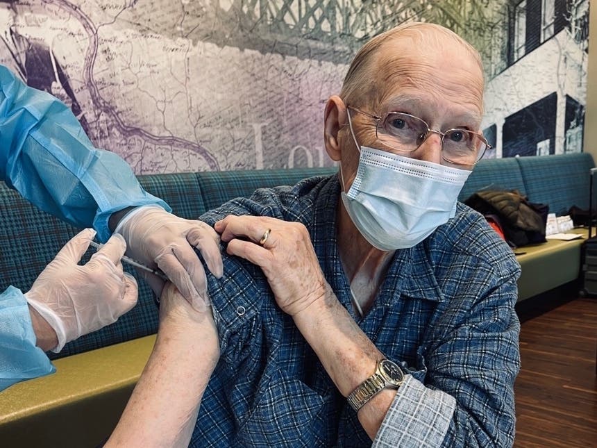 A resident at Tribute One Loudoun in Ashburn received his first dose of the Pfizer vaccine as part of a clinic held at the facility on Monday. 