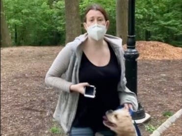 In this May 25, 2020 file photo, made from video provided by Christian Cooper, Amy Cooper talks with Christian Cooper in Central Park in New York
