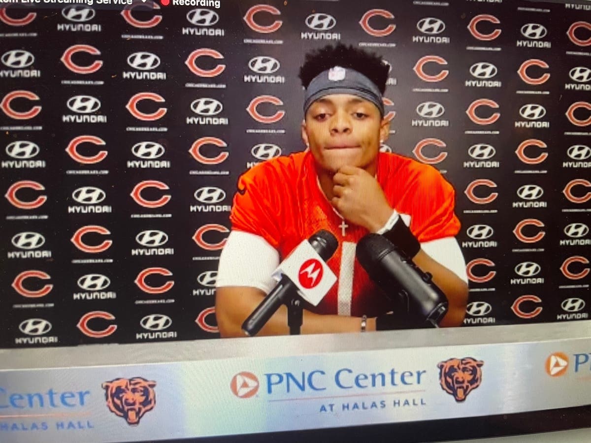 Bears rookie quarterback Justin Fields speaks with reporters Friday as he prepares to begin his first NFL rookie mini camp at Halas Hall this weekend.