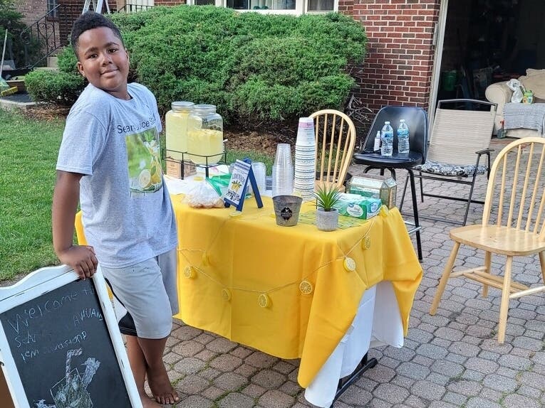 Desean Becton, 9, runs a lemonade stand in Homewood and he, along with his older brother were depositing money in an ATM in Indiana when the police were called.
