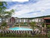Al fresco amenities at Rock Pointe in Rockaway, NJ include a pool, pool house, landscaped terrace with a fire pit, sun loungers, televisions, tot lot, a walking path, and an outdoor fitness areas for invigorating, fresh-air workouts. 