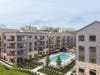 Residents at Stonehill in West Orange enjoy a stunning swimming pool surrounded by private cabanas, perfect for lounging and soaking up the sun.