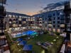 The Wyldes in Harrison, NJ offers 45,000 square feet of green space that seamlessly blends city life with the tranquility of nature.