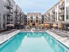The outdoor pool at Stonehill is part of a 44,000 SF amenity package designed to enhance the modern rental lifestyle. 