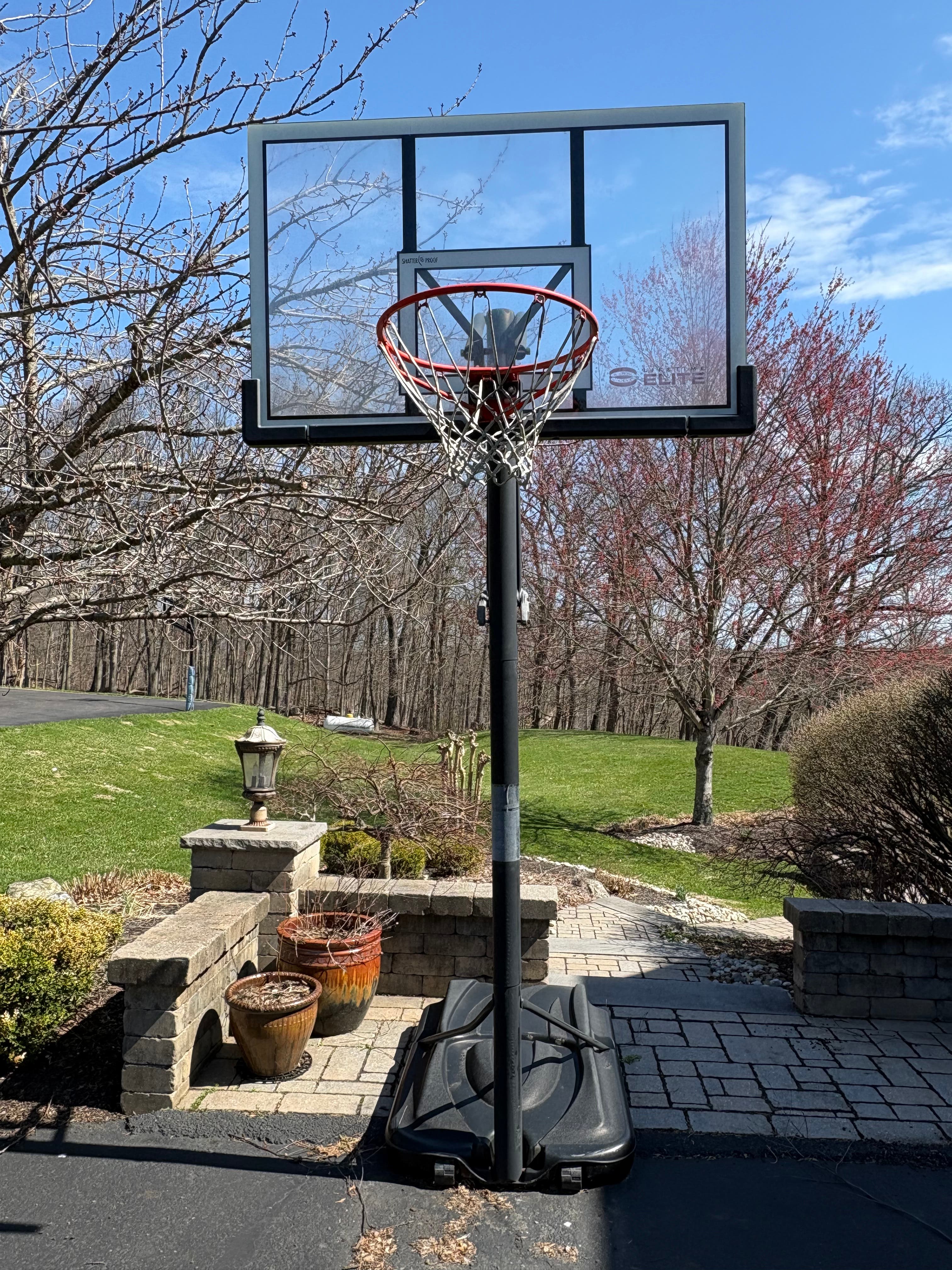 Elite adjustable basketball hoop.