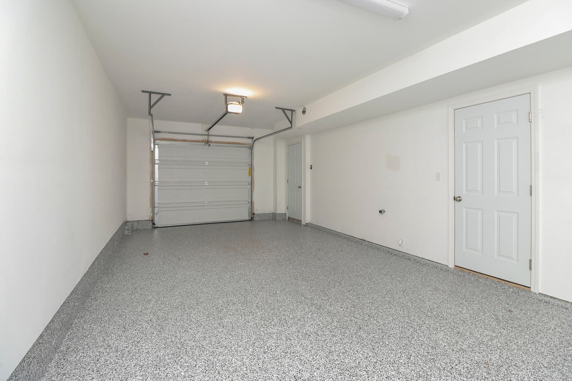 Townhomes at Eden & Main garage - epoxy coating bonus.
