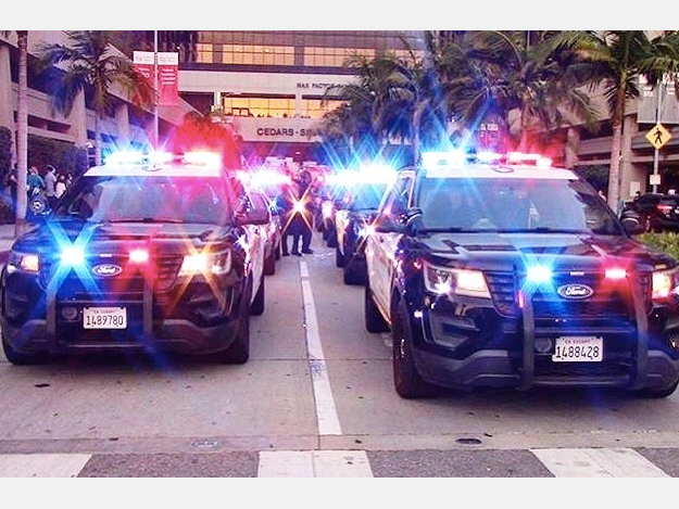A motorcade of Beverly Hills Police and Fire Department vehicles drove to Cedars-Sinai Medical Center. 