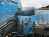 The school's courtyard now contains three marine murals.