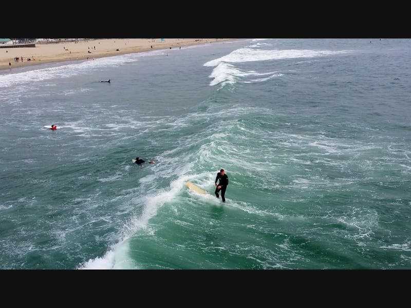 A proposed lawsuit alleges that the city Palos Verdes Estates has looked the other way on the Lunada Bay Boys, a group alleged to intimidate outsiders away from surfing at Lunada Bay Beach.