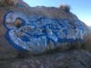 A rock at Stoney Point before Hurt painted over the graffiti.