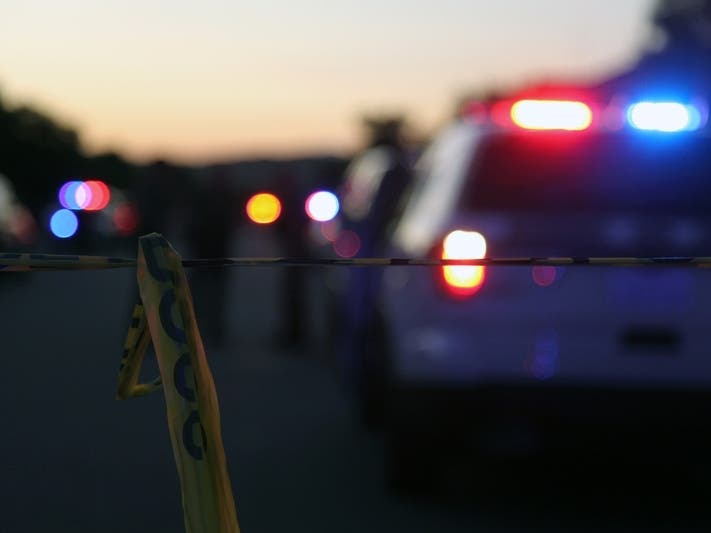 Authorities say the suspect was driving a tan or silver Chevrolet Tahoe.