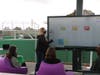 Science teacher Heather Farrell, who was instrumental in the classroom's realization, teaches a demo lesson on an 86" touchscreen TV.