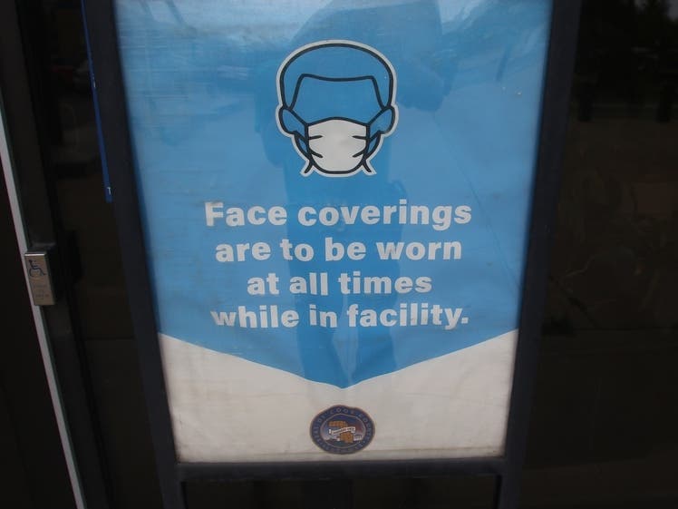 Students and staff no longer have to wear masks outdoors, but the controversial indoor mask mandate remains. 