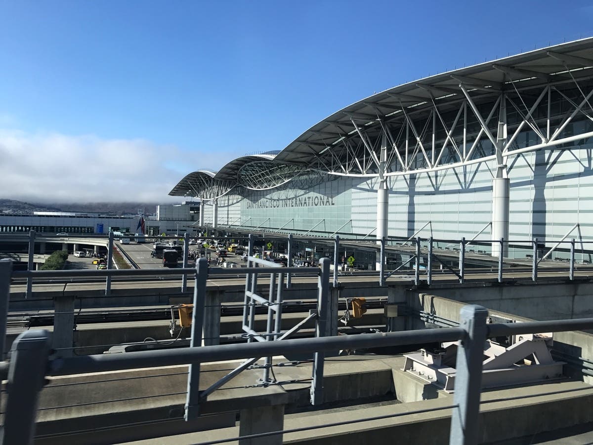San Francisco police shot and killed a man who was armed with two guns and allegedly demonstrated threatening behavior near the BART station entrance at San Francisco International Airport on Thursday morning, an airport spokesman said.