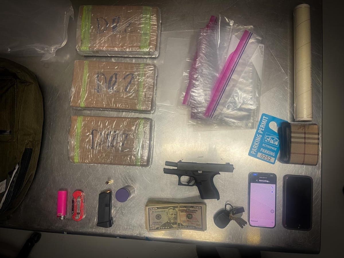 Officers found a loaded handgun, $2,000 in cash, and three kilos of cocaine.