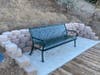 Traeger's bench, retention wall, and concrete slab.