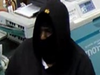 One of the suspects captured in surveillance footage. 