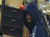 A second suspect captured in surveillance footage. 