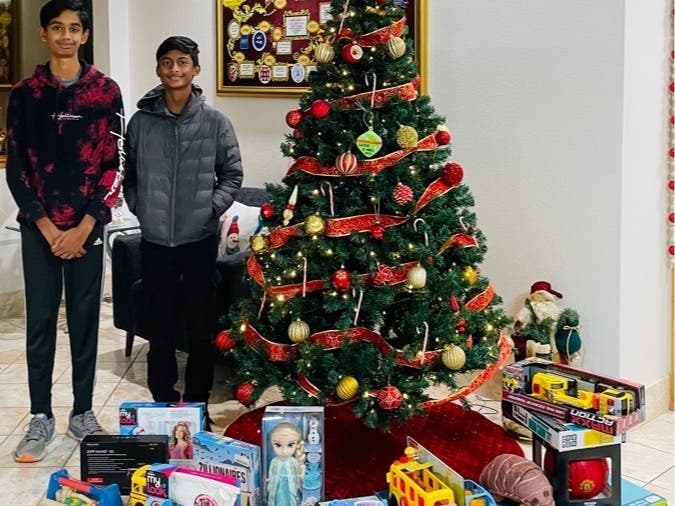 Adi Jain and Sriram Kannan collected 28 toys and $440 in cash donations. 