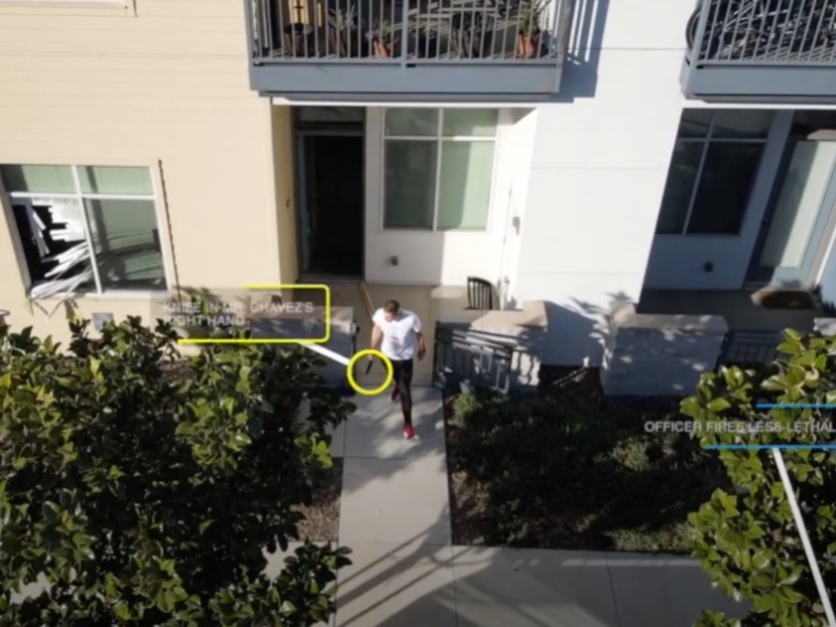 Drone footage shows Chavez exiting the apartment with a large knife as police break his window and shoot at him. 