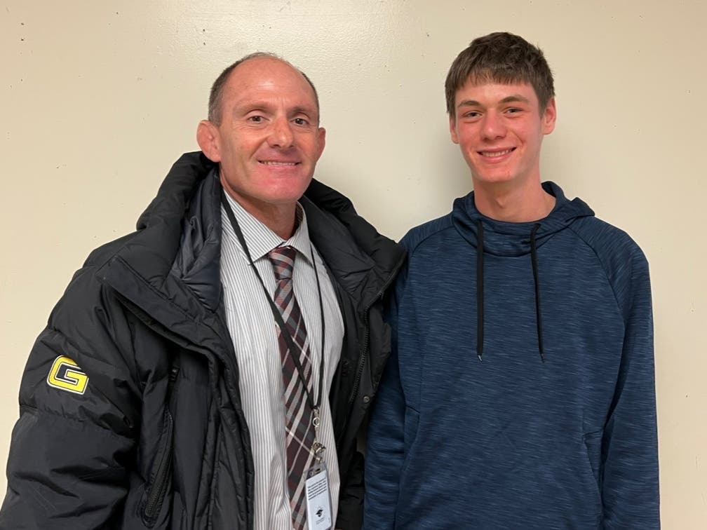 National Merit Scholar Yoav Feigenbaum with Granada High School Principal Clark Conover.