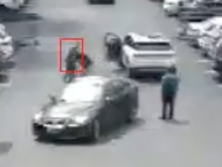 Surveillance footage shows two men fighting following a likely verbal altercation in the Costco parking lot.