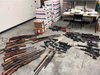 On Aug. 11, police found over 2000 illegal switchblade knives, approximately 40 rifles and handguns, and over 50 high-capacity magazines, and much more at Chopra's store and home. 