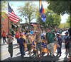Hundreds marched along Main Street to honor veterans. 