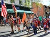 Hundreds marched along Main Street to honor veterans. 