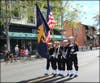 Hundreds marched along Main Street to honor veterans. 