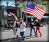 Hundreds marched along Main Street to honor veterans. 
