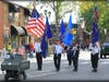 Hundreds marched along Main Street to honor veterans. 