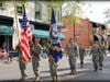 Hundreds marched along Main Street to honor veterans. 