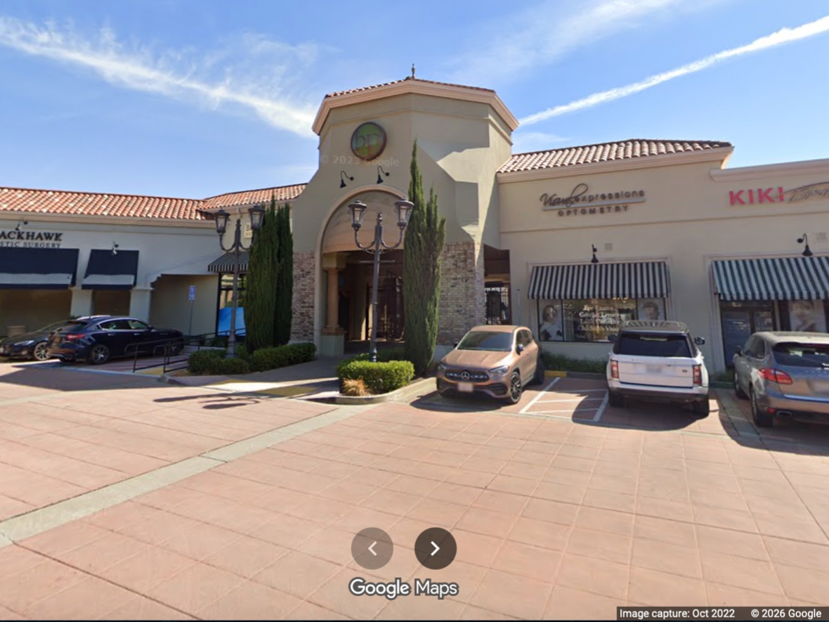 Ramanujan Group faces up to $50 million in debt as tenants and lenders take legal action.