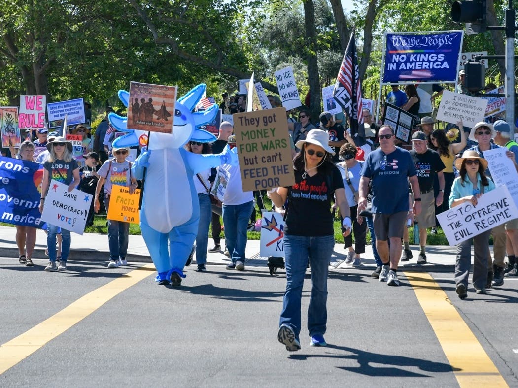 Protestors march through Livermore Saturday.