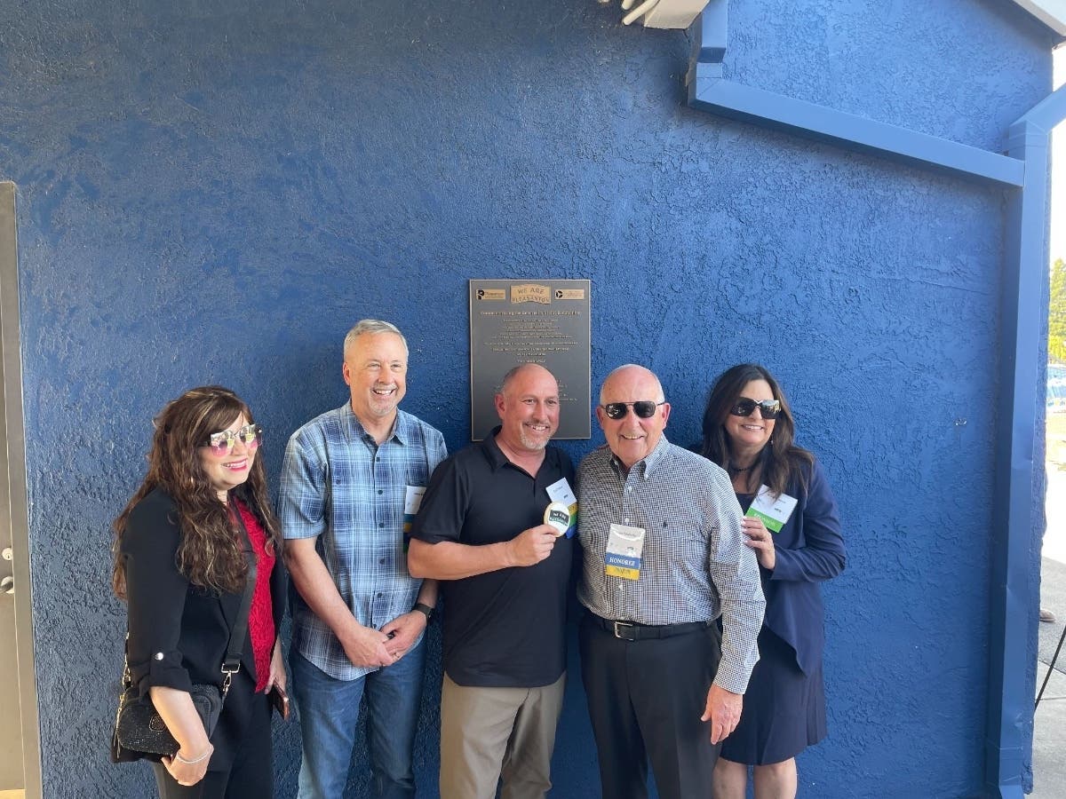 3VCF Board Member Sanjana Narang, 3VCF Board Chair John Sensiba, We Are Pleasanton co-founder Todd Utikal, 3VCF Advisory Council Member Joe Cristiano, and 3VCF CEO/President Kelly Bowers in front of the new commemorative plaque.