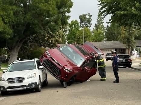 When officers arrived, they found the driver safely out of the car, but their three-year-old child remained securely buckled in the child safety seat while the car rested on two wheels.