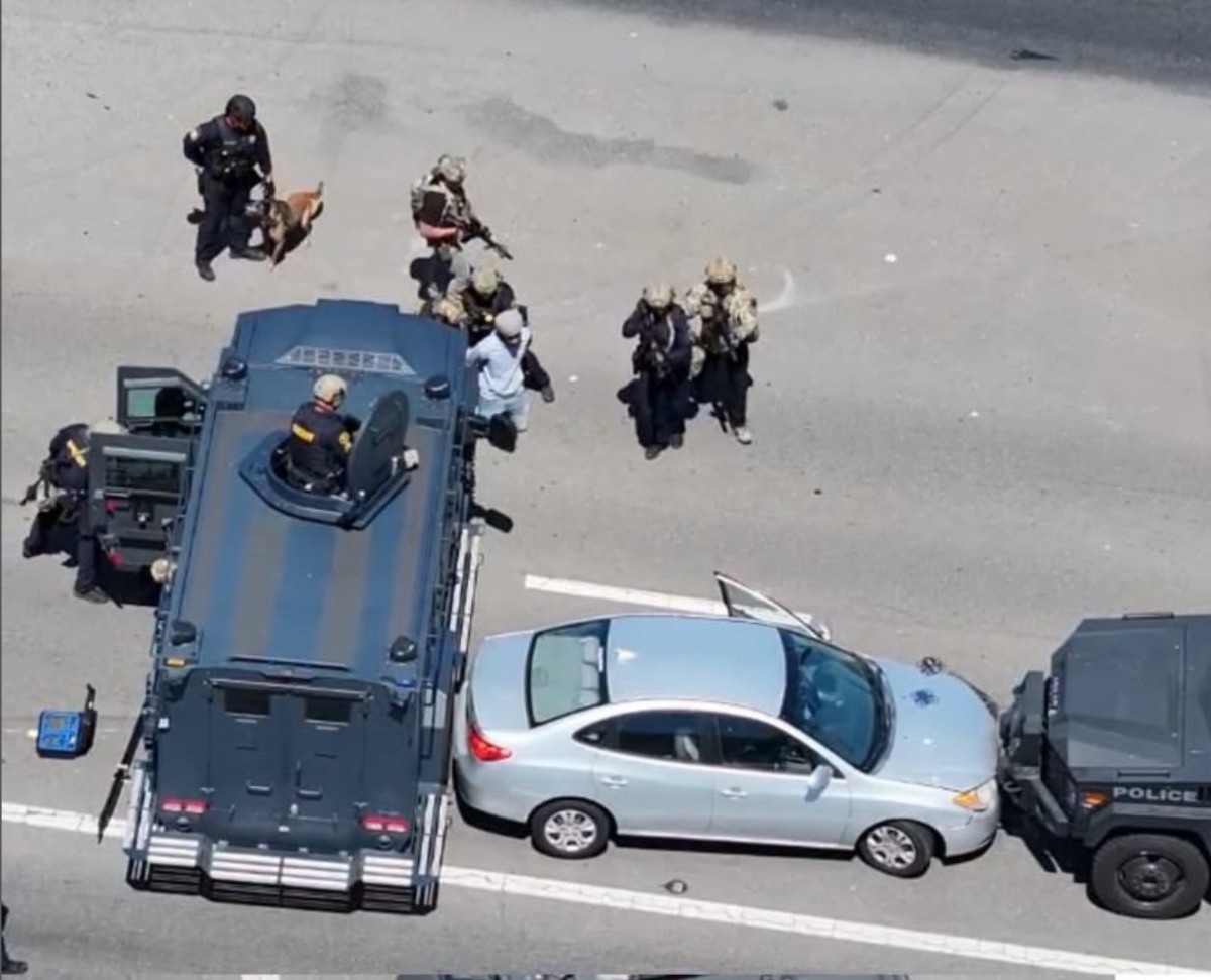 A Hayward man was arrested on suspicion of brandishing a gun and leading deputies on a freeway chase that eventually ended in a lengthy San Leandro standoff.