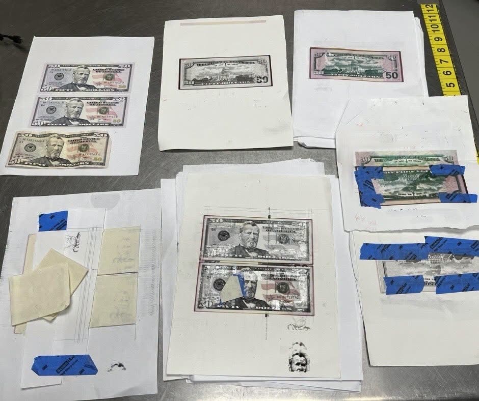 Investigators believe the group was producing counterfeit $50 and $100 bills they planned to use at the outlets over the weekend.