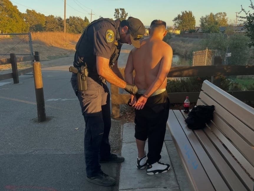 An Oakland man was arrested on the Iron Horse Trail in Dublin after a witness suffered minor abrasions during an altercation, police said.