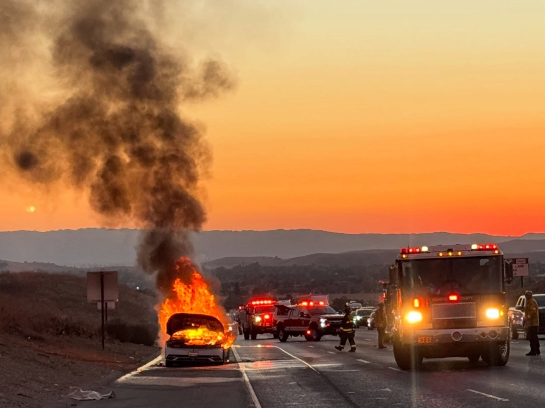 An electric Hyundai was destroyed after a three-vehicle crash that closed lanes for more than three hours.