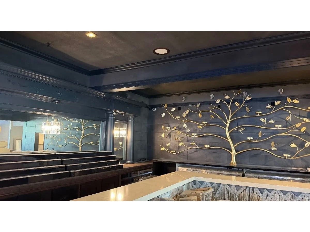 The new location will feature a historic wrap-around bar that can accommodate 20 people.